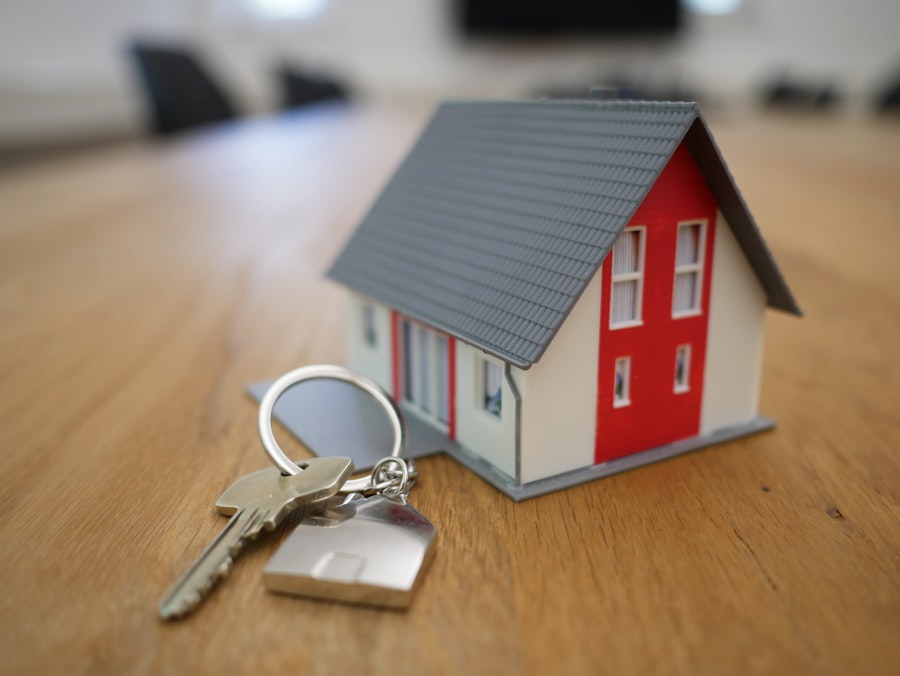 Home inspection evidence photo showing a model house and keys